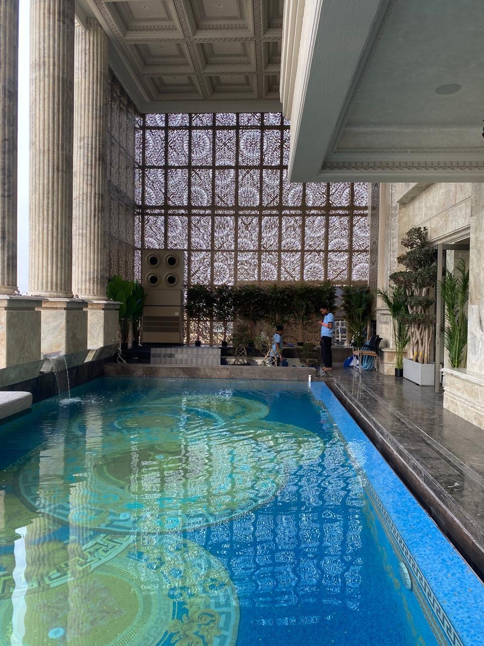 Laser jali pool enclosure